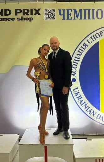 Софія Отцевич із тренером Олександром Яночком 