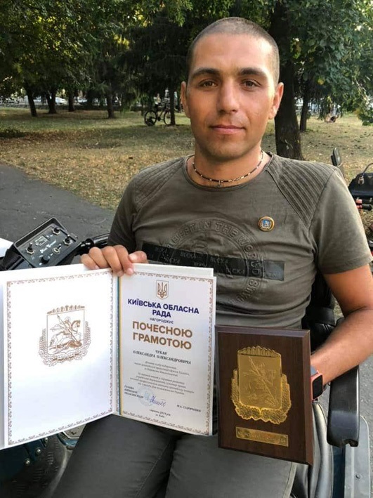 Олександр Чубай із нагородою