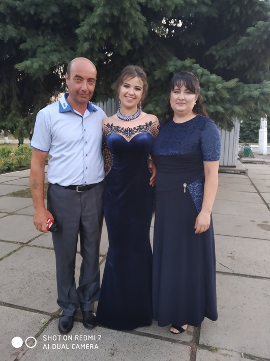 Юрій та Світлана Грицаї зі своєю донькою Антоніною